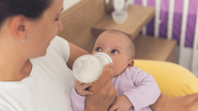 Mother and baby bonding during a bottle feed