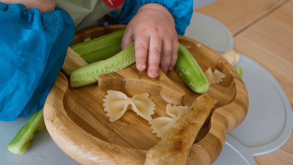 Baby eating finger foods